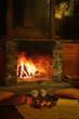 © Duet Postscriptum/Stocksy - Cozy winter still life near fireplace