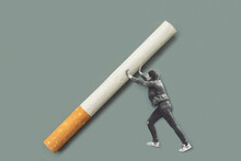 Person Holding A Bi¡g Cigarette