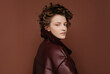© Sergey Filimonov/Stocksy - Androgynous model in trendy outerwear