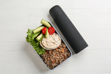 Wall Mural - Thermos and lunch box with food on white wooden background, flat lay