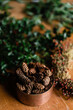 © Léa Jones/Stocksy - pine cones for wreath making