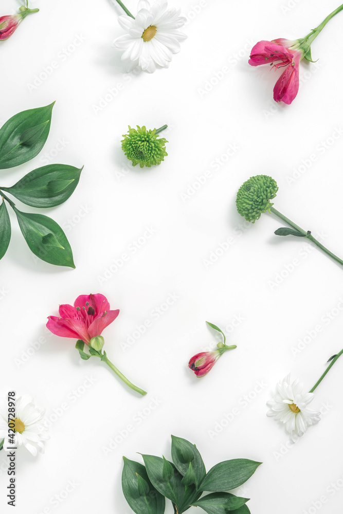 2021 Creative spring flat lay pattern with pink flowers and green ...