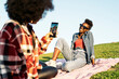© Nunez Image/Stocksy - Afro Girl Photographing her Friend