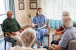 © Rido - Self help therapy group meeting in nursing home during covid