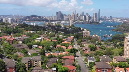 Sticker - Slow aerial flying to Sydney city CBD from North Sydney green park as 4k.
