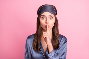 Sticker - Photo portrait of woman covering mouth lips with finger isolated on pastel pink colored background