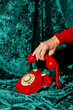 © Juan Moyano/Stocksy - picking up or hanging up the telephone