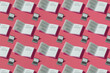 © Maki Company Limited/Stocksy - Laptop and book isolated seamless pattern on white background.