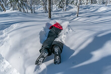 Accident With A Skier In The Forest, Which Lies In A Snowdrift