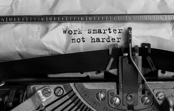 Text Work smarter not harder typed on retro typewriter