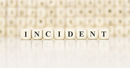 Poster - Word INCIDENT made with wood building blocks