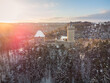 Aerial view of medieval castle Kokorin in winter during sunrise. National park Kokorinsko nearby Prague in Czech Republic. Central Europe.