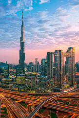 Wall Mural - View on modern skyscrapers and busy evening highways in luxury Dubai city,Dubai,United Arab Emirates