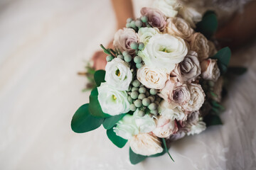 Wonderful luxury wedding bouquet of different flowers