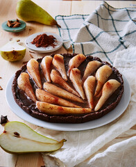 pear and chocolate homemade cake tart with slice