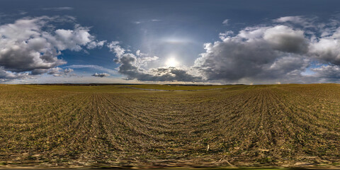 Wall Mural - full seamless spherical hdri panorama 360 degrees angle view among farm fields in spring day awesome clouds in equirectangular projection, ready for VR AR virtual reality content