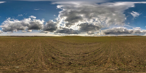 Wall Mural - full seamless spherical hdri panorama 360 degrees angle view among farm fields in spring day awesome clouds in equirectangular projection, ready for VR AR virtual reality content