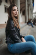 © Connect Images - Woman daydreaming on steps