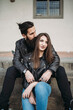© Connect Images - Man kissing hair and hugging woman from behind on steps