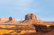 The view across buttes and sandstone formations in Monument Valley. 