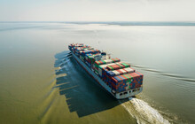 High Angle View Of Large Container Ship Heading Towards The Port Of Antwerp, Belgium.