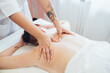 © Connect Images - Woman getting a back massage in a beauty salon.