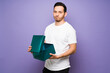 © AntonioDiaz - Latin man feeling disappointed after opening a bad present