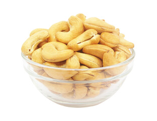 Roasted cashew nuts in glass bowl isolated on white background