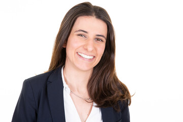 pretty young business woman brown hair in suit posing over white wall background