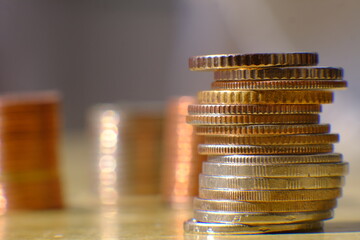 Stacks of gold money coin on black background and concept saving money, Business growth strategy of money concept, Advertising coins of finance and banking