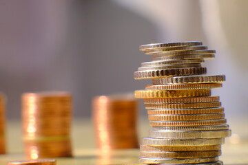 Stacks of gold money coin on black background and concept saving money, Business growth strategy of money concept, Advertising coins of finance and banking