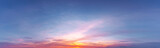 Fototapeta Na sufit - panoramic sunrise with cirrus clouds illuminated by the rays of the sun