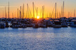 Sunset over the Hillarys marina full of mooring boats - Perth, WA, Australia