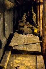 Wall Mural - Mannequin of a miner in a black coal mine in a mine.