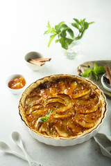 Wall Mural - Traditional homemade apple tart with apricot jam