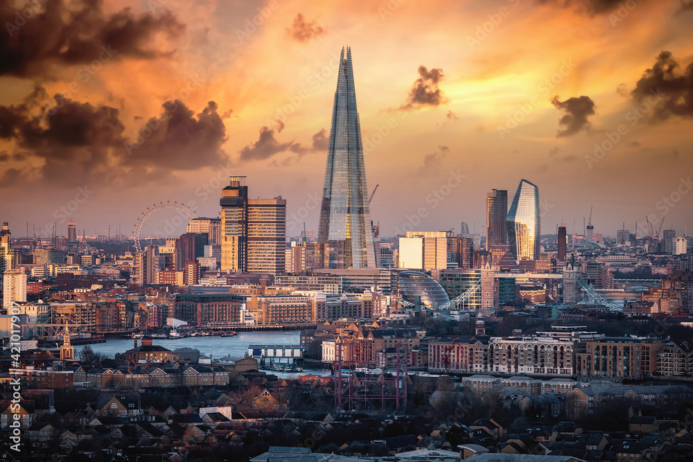 The modern skyline of London, UK, during sunrise with Tower Bridge and all attractions along Thames river - obrazy, fototapety, plakaty 