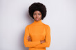 © deagreez - Photo of serious strict lady crossed hands look camera wear orange turtleneck isolated grey color background