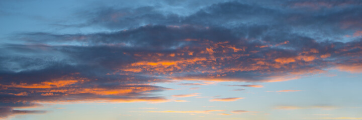 Wall Mural - colorful sky with clouds at sunset, panoramic nature background and web banner
