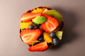Wall Mural - health food- fresh fruit salad with strawberry, blueberry,kiwi and orange
