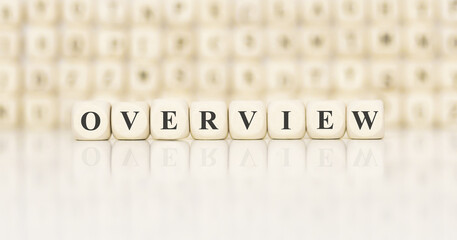 Poster - Word OVERVIEW made with wood building blocks