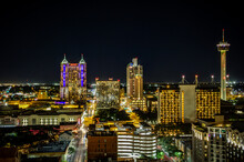 San Antonio City Skyline Panorama At Night. The Skyline In This Photo Includes Marriott Rivercenter, The Torch Of Friendship, Marriott Riverwalk