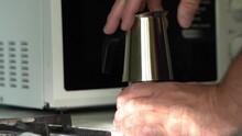 A Man Disassembles A Moka Pot, A Geyser Coffee Maker, Prepares To Make Coffee. Close-up, Full HD.