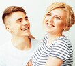 © iordani - young pretty teenage couple, hipster guy with his girlfriend happy smiling and hugging isolated on white background, lifestyle people concept