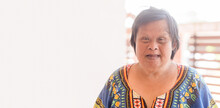 Smiling Asian Down Syndrome Woman.Adult Down Syndrome.mentally Disabled Woman.Therapy Mental Health.Happy Woman Mother.Disability Person.caregiver, Senior Woman Portrait.health, Care, Medical Work.