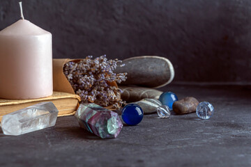 Wall Mural - Magic still life with fluorite, quartz crystal and pink candle. Magic rocks for mystic ritual, witchcraft Wiccan or spiritual practice (healing). Meditation reiki. Ritual for love and chakra balance.