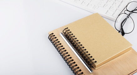 Poster - notebooks and laptop keyboard, pen , glasses and glasses on white background