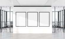 Three Vertical Frames Mockup Hanging On Wall. Mock Up Of Billboards In Modern Concrete Office Interior 3D Rendering
