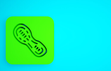 Wall Mural - Green Human footprints shoes icon isolated on blue background. Shoes sole. Minimalism concept. 3d illustration 3D render