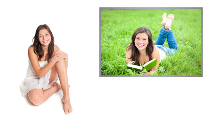 Beautiful young woman in front of an outdoor portrait photo of herself, isolated in front of white background