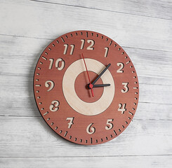 Wooden clock on a background